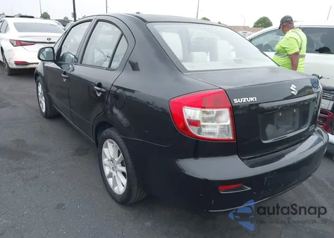 2011 Suzuki Sx4 Le z USA, uszkodzony, nr VIN JS2YC5A28B6301189